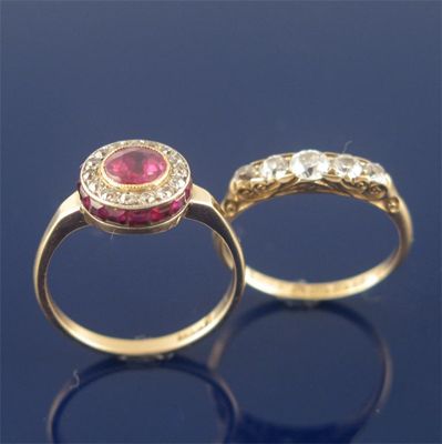 Appraisal: A ruby and diamond cluster ring the circular cut ruby