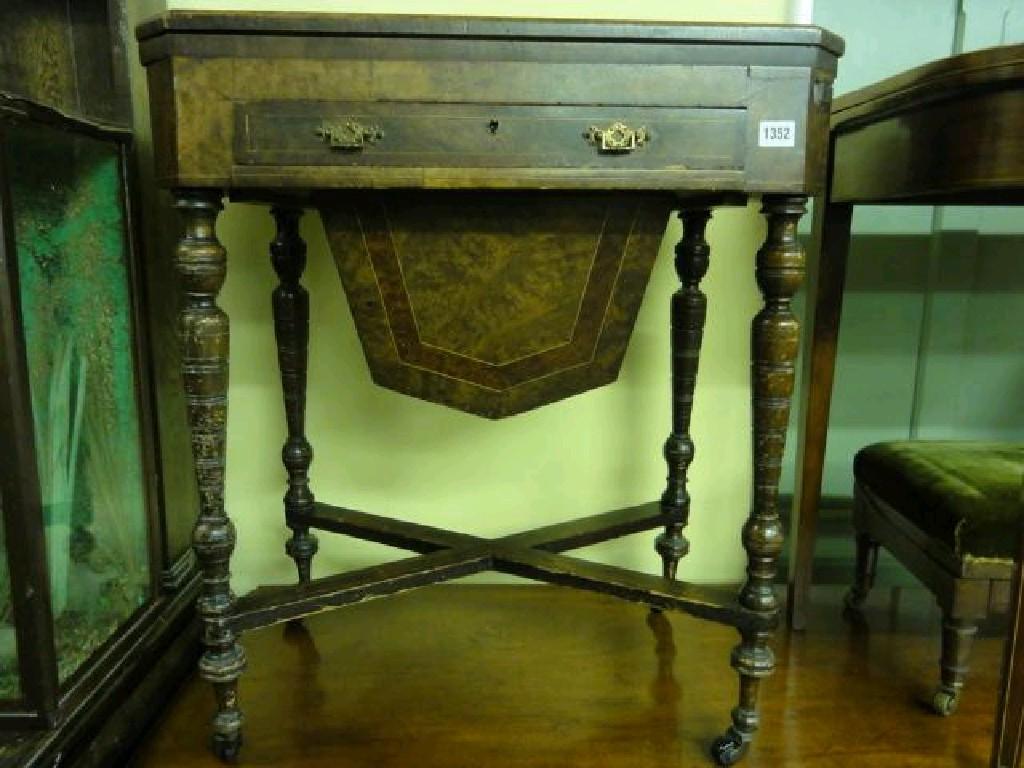 Appraisal: A Victorian walnut figured and burr walnut veneered games work