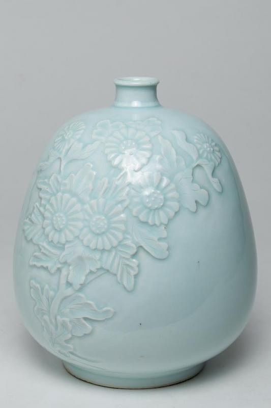 Appraisal: Korean Celadon-Glazed Pottery Vase Korean celadon-glazed pottery vase the body