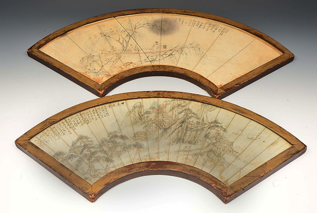 Appraisal: A PAIR OF JAPANESE FANS perhaps painted silk with landscape