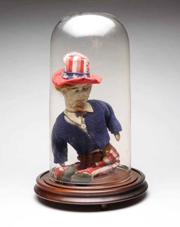 Appraisal: UNCLE SAM DOLL IN GLASS CLOCHE American first half th