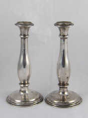 Appraisal: A pair of Viennese silver baluster candlesticks Vienna standard assay