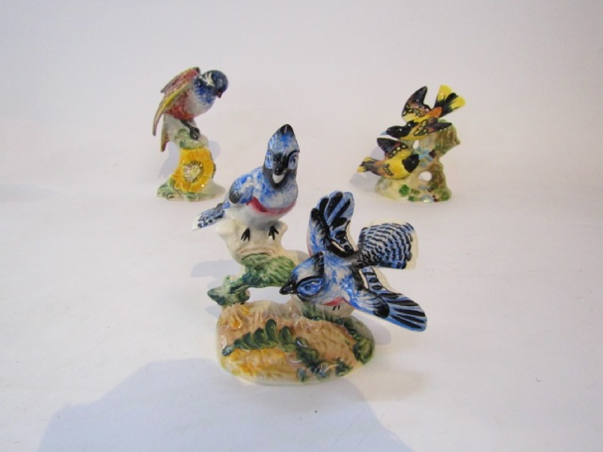 Appraisal: Three Beswick groups of birds comprising Baltimore oriels with impressed