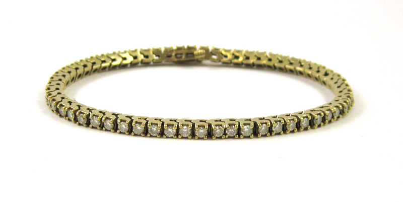 Appraisal: DIAMOND AND FOURTEEN KARAT GOLD BRACELET measuring approximately - inches