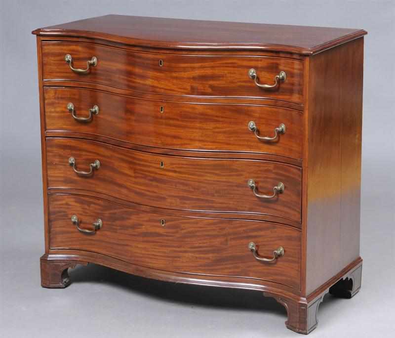 Appraisal: GEORGE III CARVED MAHOGANY SERPENTINE FRONTED CHEST OF DRAWERS The