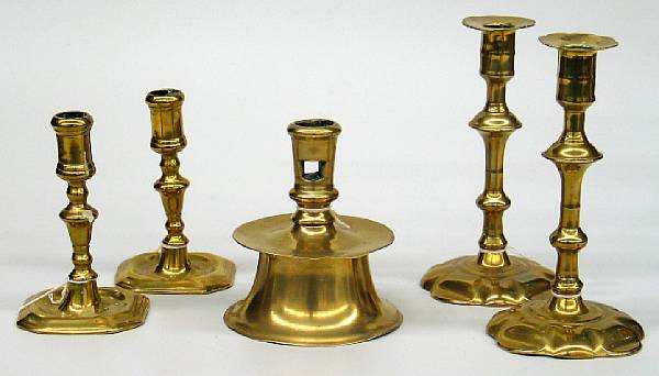 Appraisal: A group of five brass candlesticks th th century Comprising