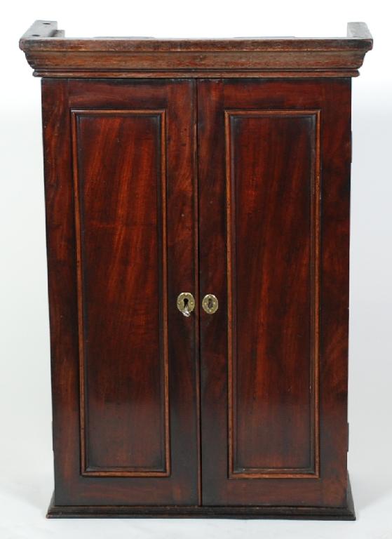 Appraisal: NINETEENTH CENTURY AND LATER MAHOGANY MURAL CABINET the moulded cornice