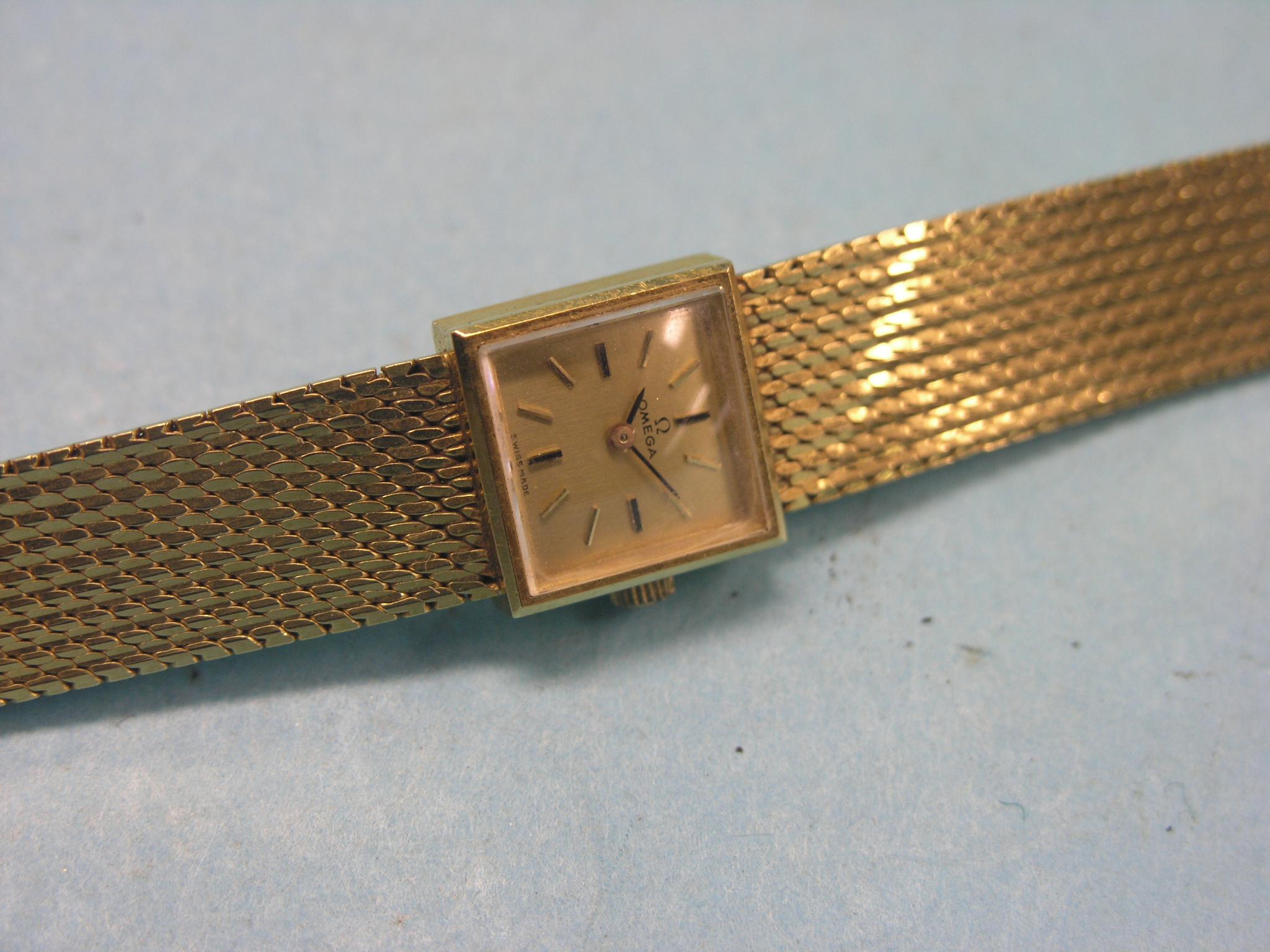 Appraisal: A lady's ct gold Omega wristwatch small square dial on