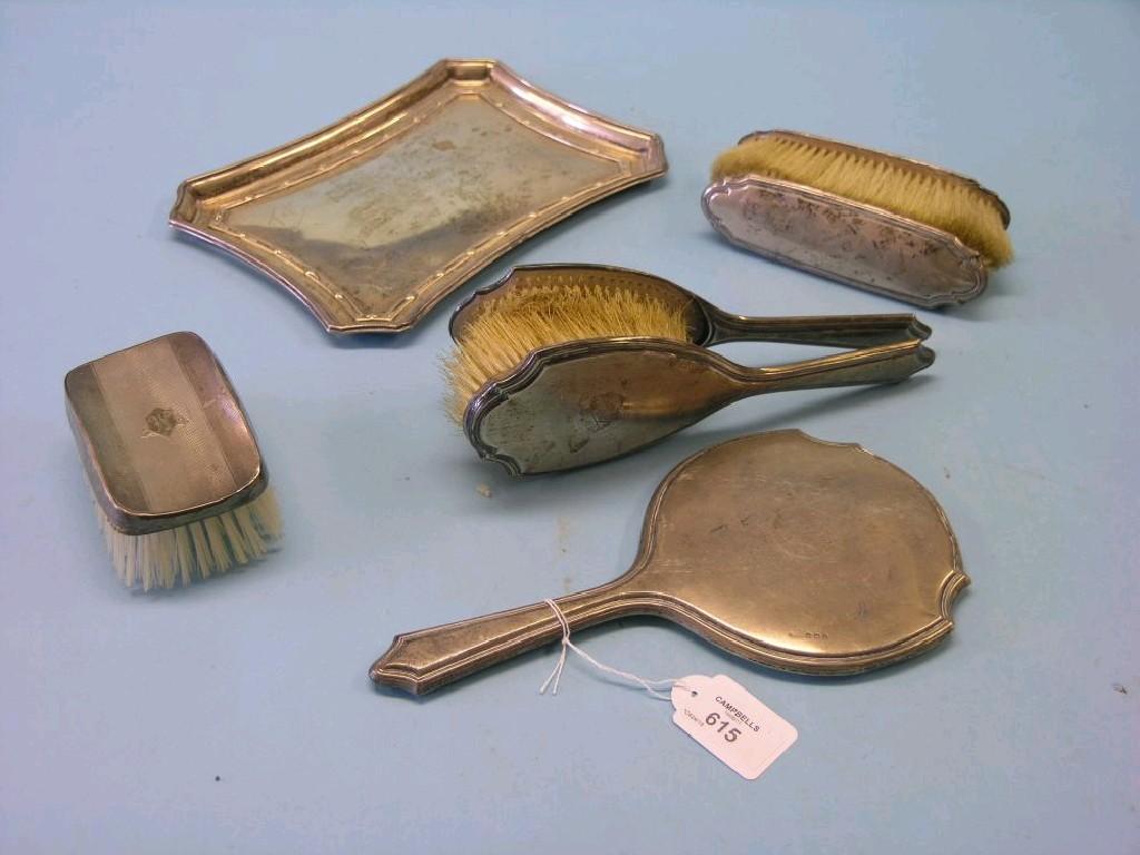 Appraisal: A silver dressing table tray Birmingham a silver five-piece brush