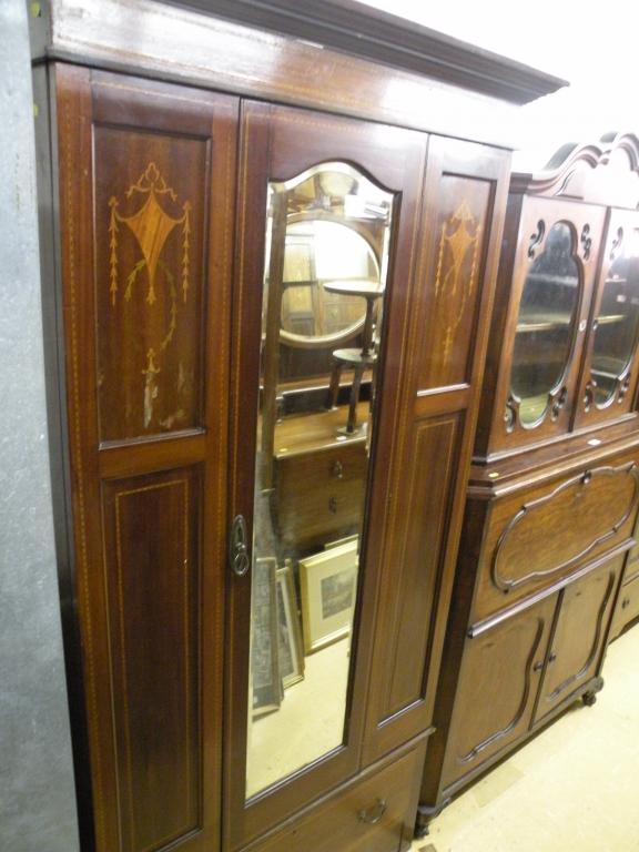 Appraisal: An Edwardian mahogany marquetry and chequer banded wardrobe with a