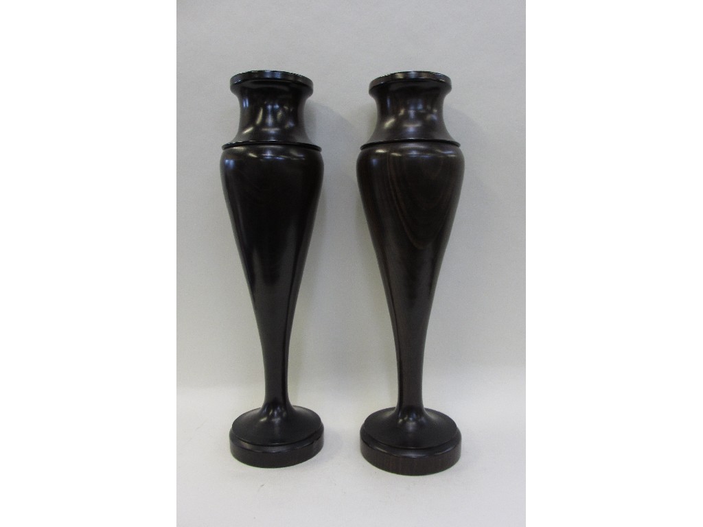 Appraisal: Pair of turned wooden vases