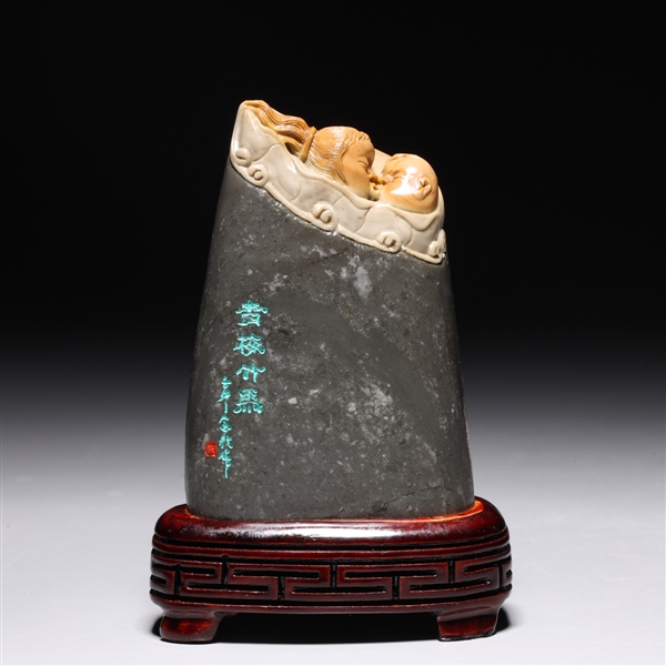 Appraisal: Antique Chinese hardstone sculpture depicting kissing heads with incised calligraphy