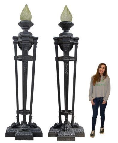 Appraisal: pair Monumental French architectural cast iron torchieres mid thc flame