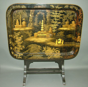 Appraisal: A Victorian chinoiserie style lacquered tray decorated with figures in