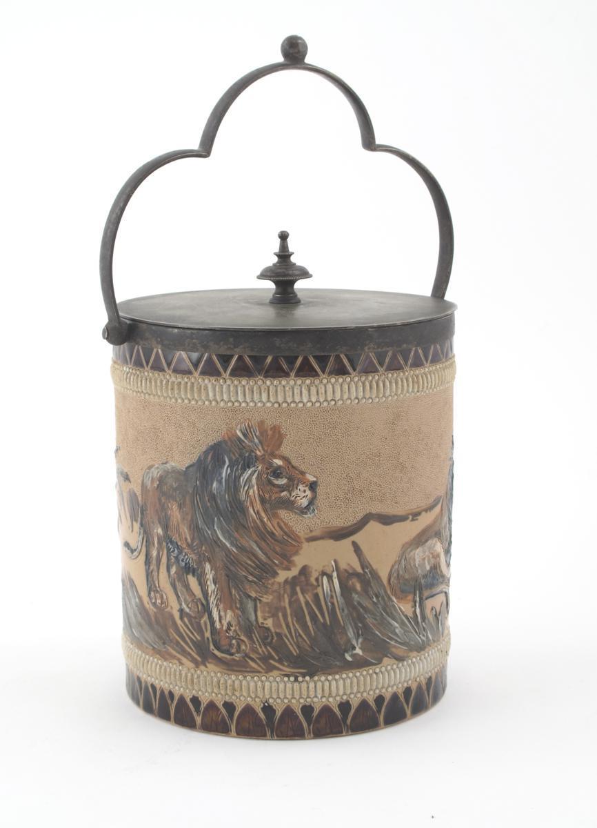 Appraisal: A Doulton Lambeth stoneware biscuit barrel and electroplated