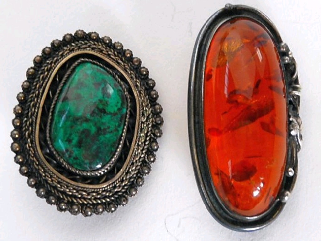 Appraisal: ISRAELI SILVER AND CABOCHON MALACHITE OVAL BROOCH AND A LONG