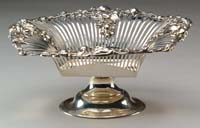 Appraisal: KIRKPATRICK SILVER COMPOTE Reticulated bowl with repose decoration of leaves