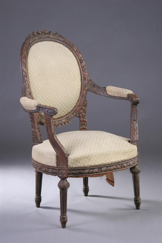 Appraisal: LOUIS XVI STYLE OAK FAUTEUIL early th century Crested medallion