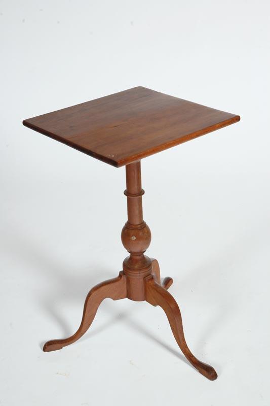 Appraisal: CANDLESTAND American st half- th century cherry Turned pedestal base