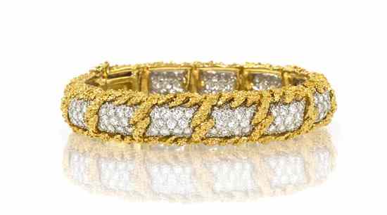 Appraisal: An Karat Gold and Diamond Textured Bracelet consisting of white