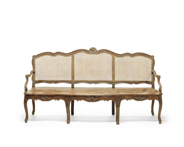 Appraisal: A French th century Louis XV carved beechwood three-seat canap