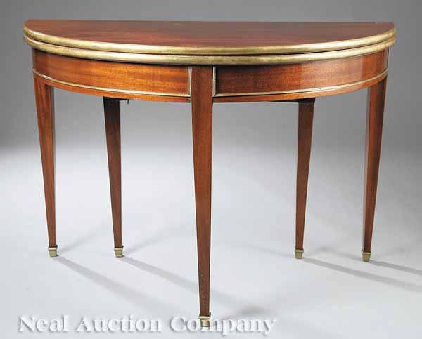 Appraisal: An Antique Empire-Style Brass-Mounted Mahogany Console Table demilune top with