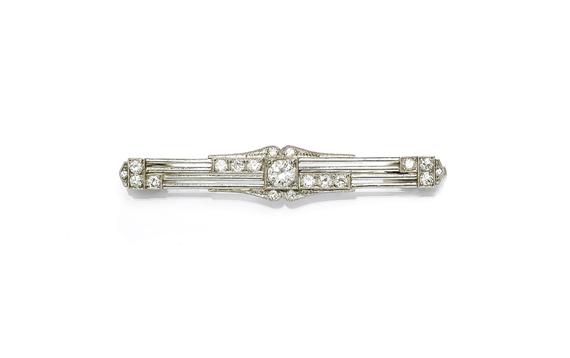 Appraisal: A DIAMOND BAR BROOCH circa Platinum Fancy pierced brooch set