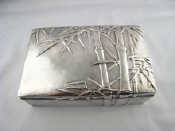 Appraisal: A Chinese silver cigarette case the matted finish with embossed