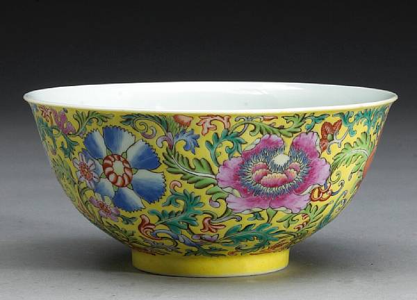 Appraisal: A yellow ground porcelain bowl with famille rose decoration Qianlong