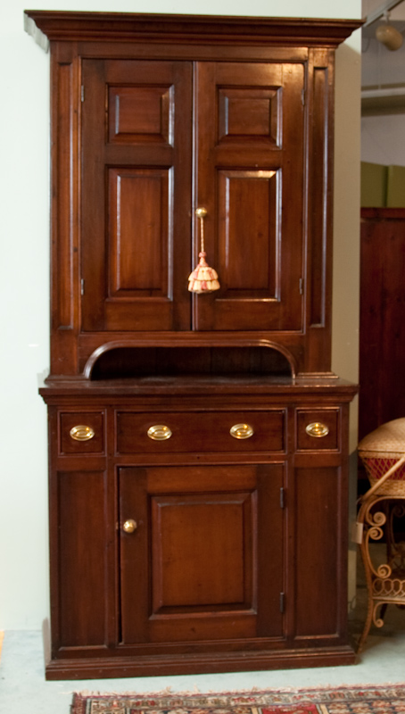 Appraisal: An E th C Mahogany Step-back Cupboard with multiple secondaries