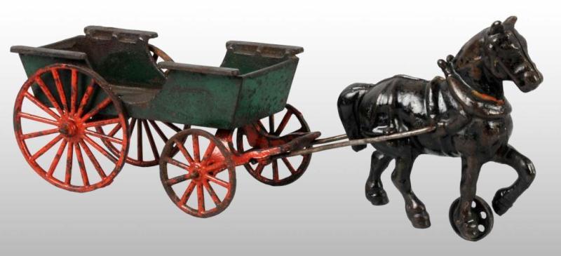 Appraisal: Cast Iron Single Horse-Drawn Farm Wagon Toy Description Green and