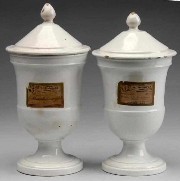 Appraisal: Pair of Ceramic Spanish Apothecary Jars with Lids Description Circa