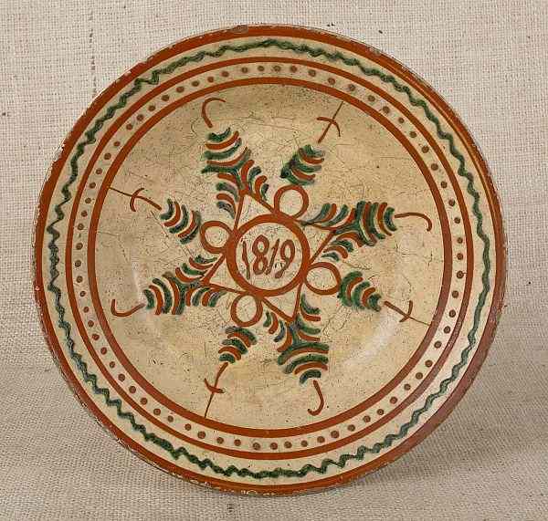 Appraisal: Redware shallow bowl dated with green and red slip decoration