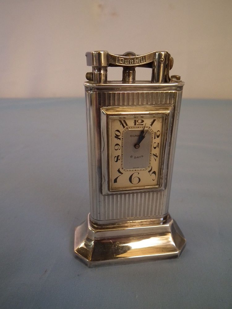 Appraisal: DUNHILL LIGHTER WATCH Old silver plated Dunhill lighter watch with