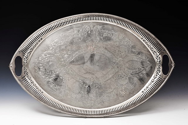 Appraisal: A VICTORIAN OVAL SILVER TRAY with pierced and gadrooned border