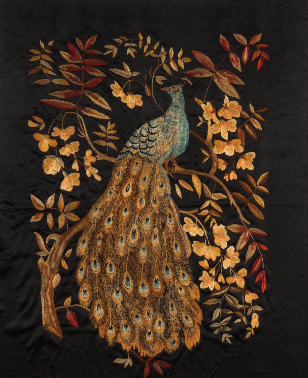 Appraisal: Needlework on velvet of a peacock on a branch American