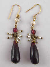 Appraisal: A pair of garnet and freshwater pearl drop earrings approx