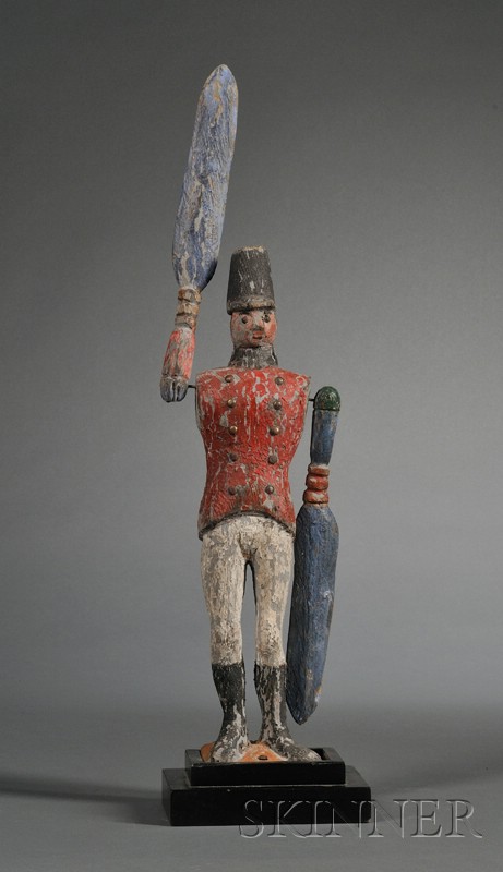 Appraisal: Polychrome-painted Wooden Soldier Whirligig America late th century the figure