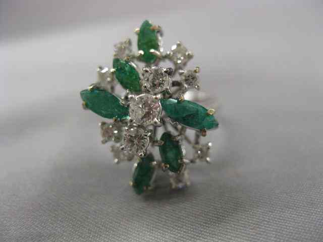 Appraisal: Emerald Diamond Ring marquise emeralds totaling carats and diamonds totaling