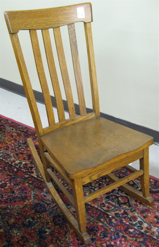 Appraisal: AN OAK SEWING ROCKER WITH DRAWER American early th century