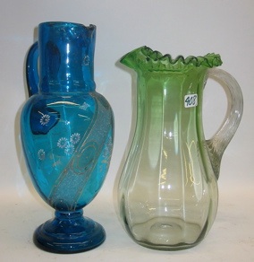 Appraisal: TWO AMERICAN VICTORIAN COLORED GLASS WATER PITCHERS One is in