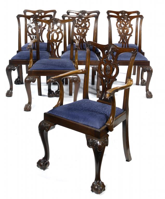 Appraisal: A SET OF EIGHT MAHOGANY DINING CHAIRS with leafy carved