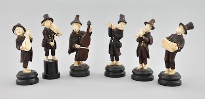 Appraisal: Six Carved Wood and Bone Figurines of Musicians Comically stylized