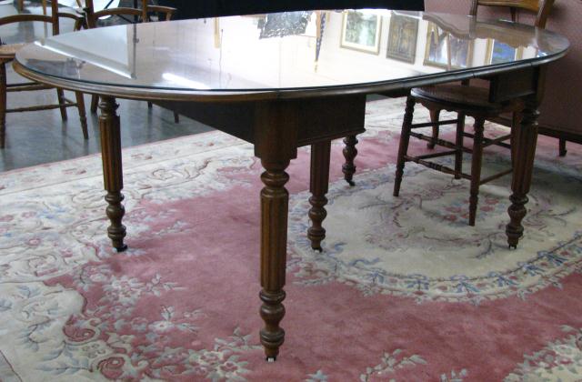 Appraisal: Walnut Victorian Table with two Leaves and turned legs