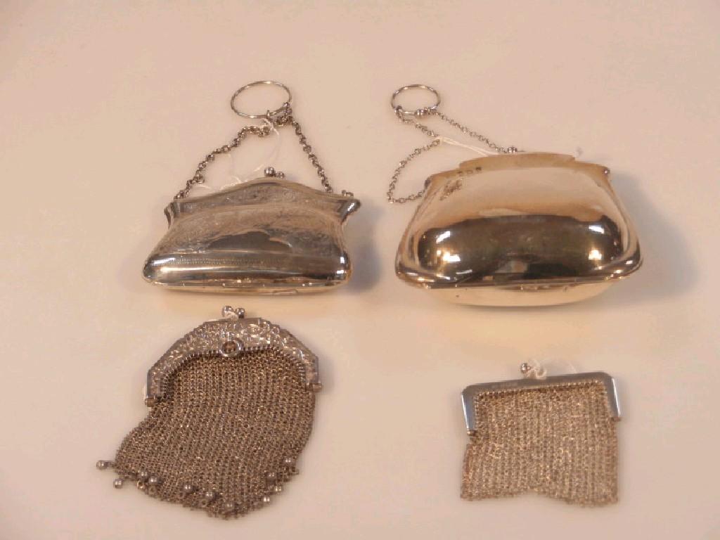 Appraisal: A George V silver purse Birmingham engraved with foliate scrolls