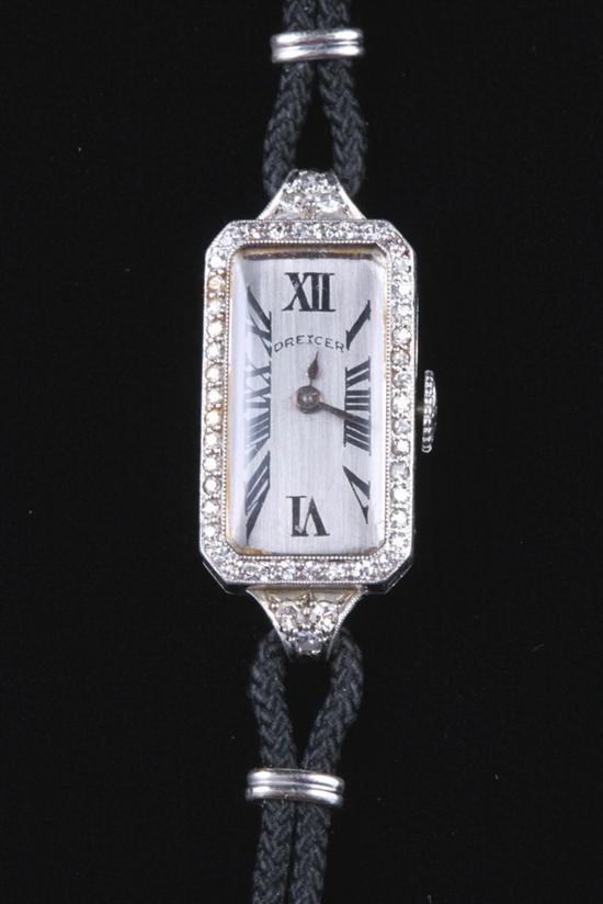 Appraisal: LADY'S K WHITE GOLD AND DIAMOND EVENING WATCH By Dreicer