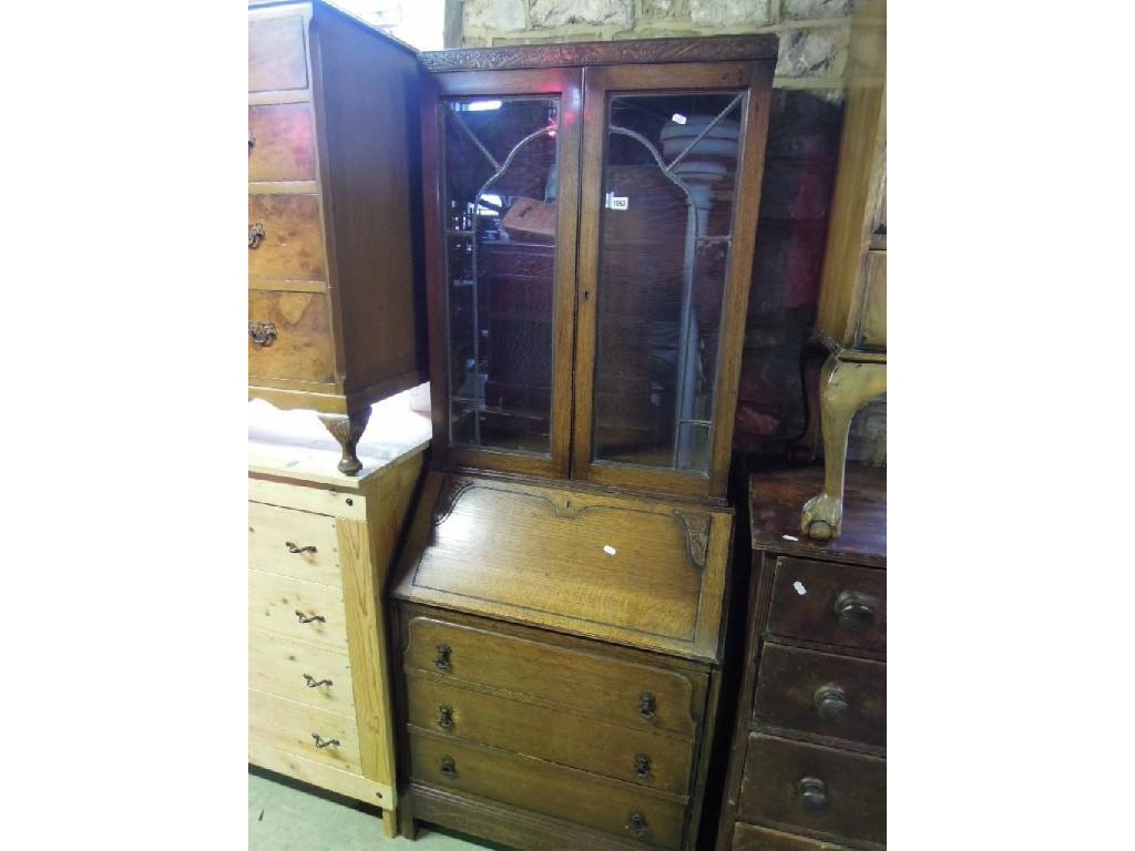 Appraisal: A 's 's oak bureau bookcase the bookcase enclosed by