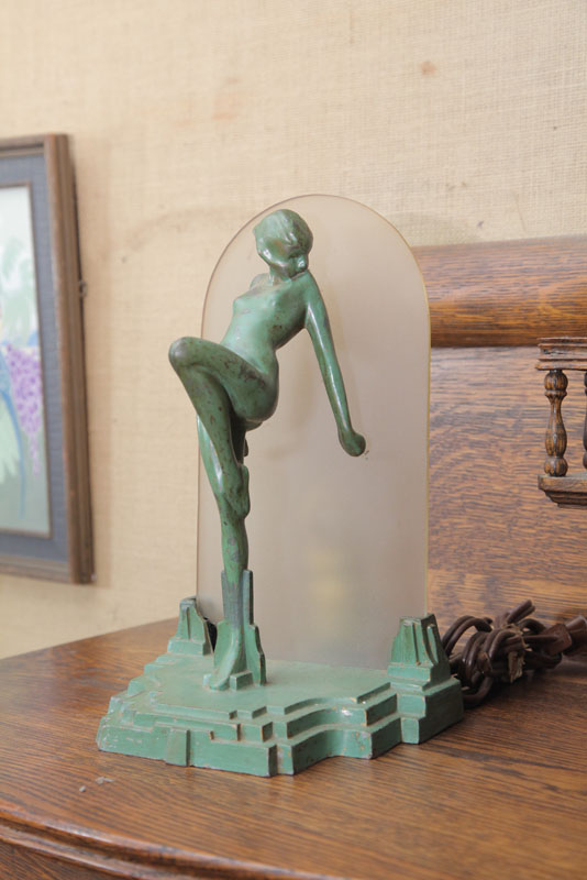 Appraisal: FRANK ART LAMP Green painted cast iron nude on a