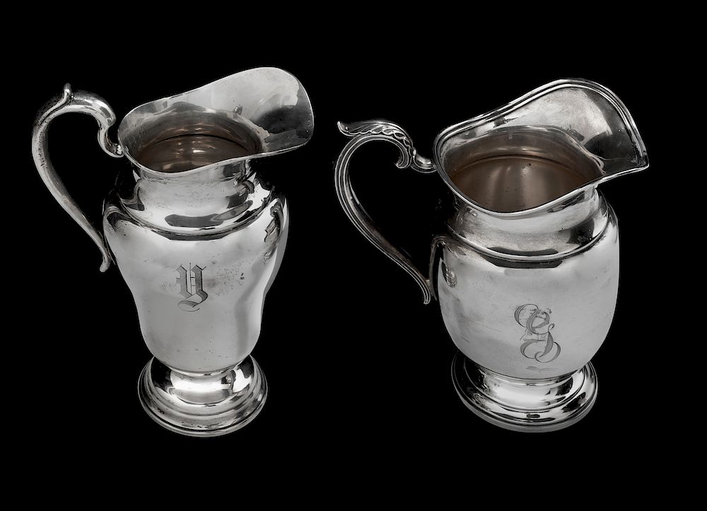 Appraisal: Two American Silver Water Pitchers Two American Silver Water Pitchers