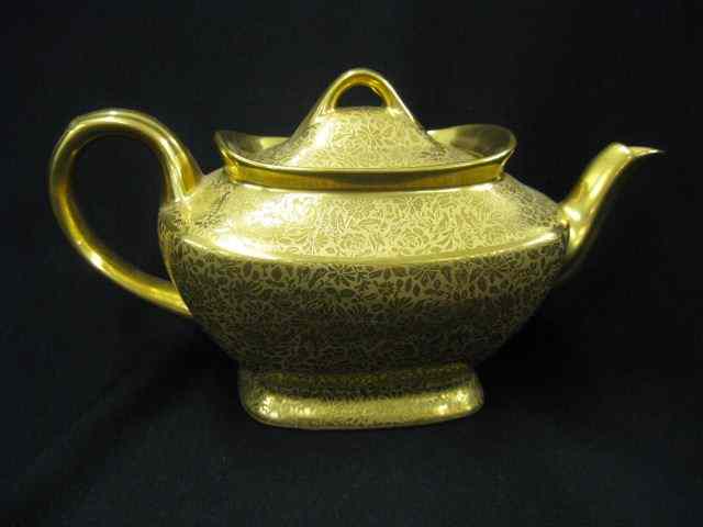 Appraisal: Wheeling Gold Encrusted China Teapot elaborate overall floral '' excellent